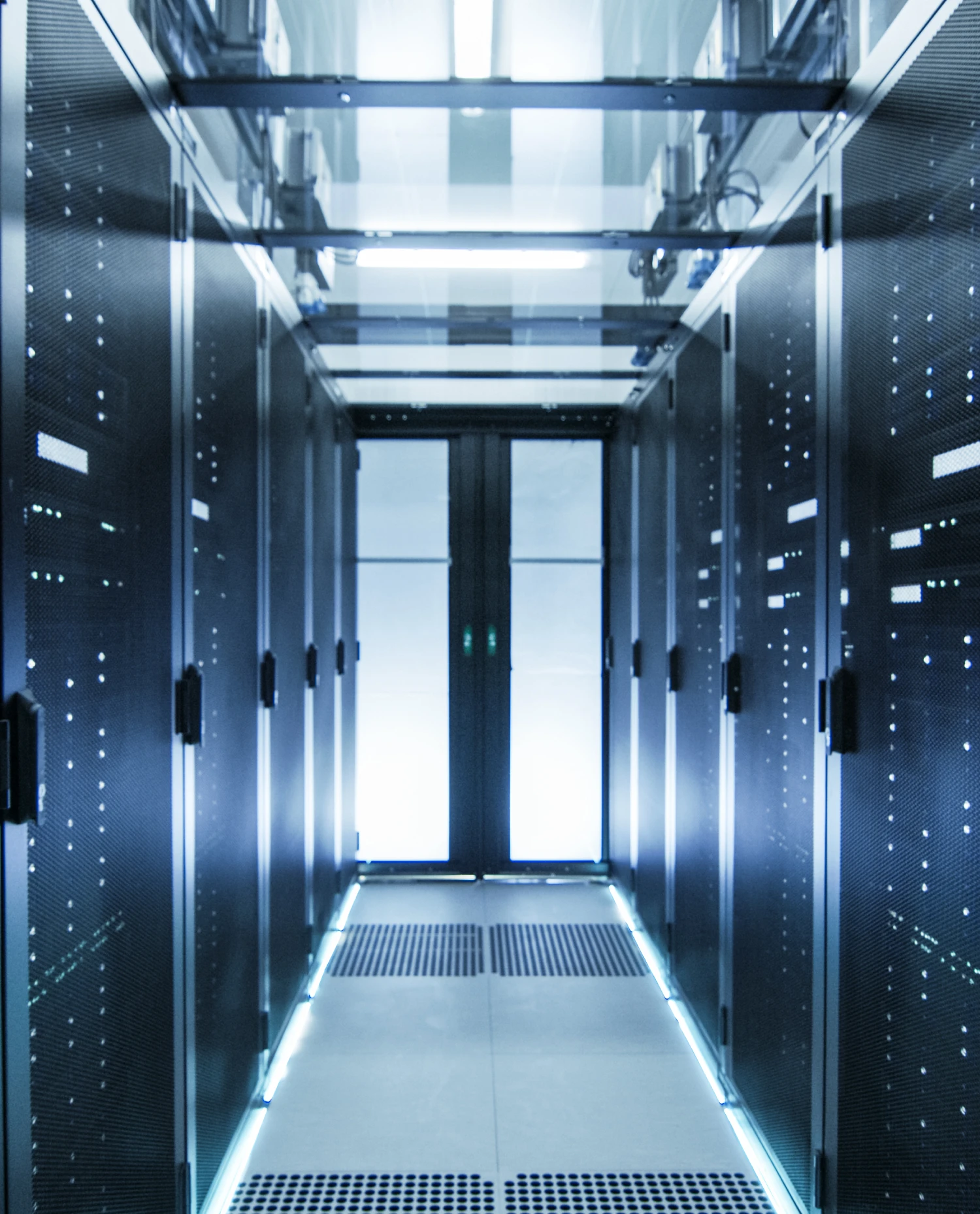 Modern data center with illuminated servers.