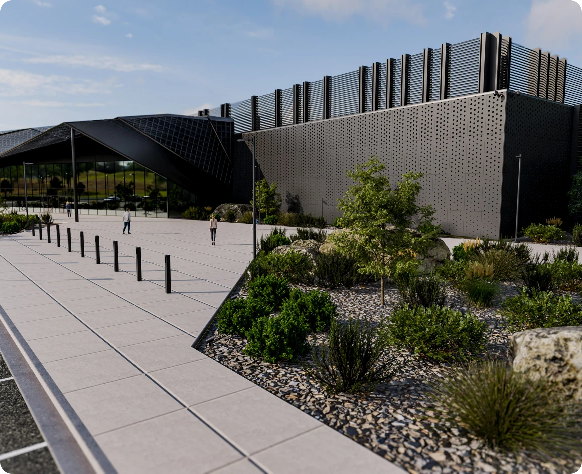 Modern building with landscaped garden and pathway.